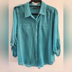 Metaphor turquoise blouse